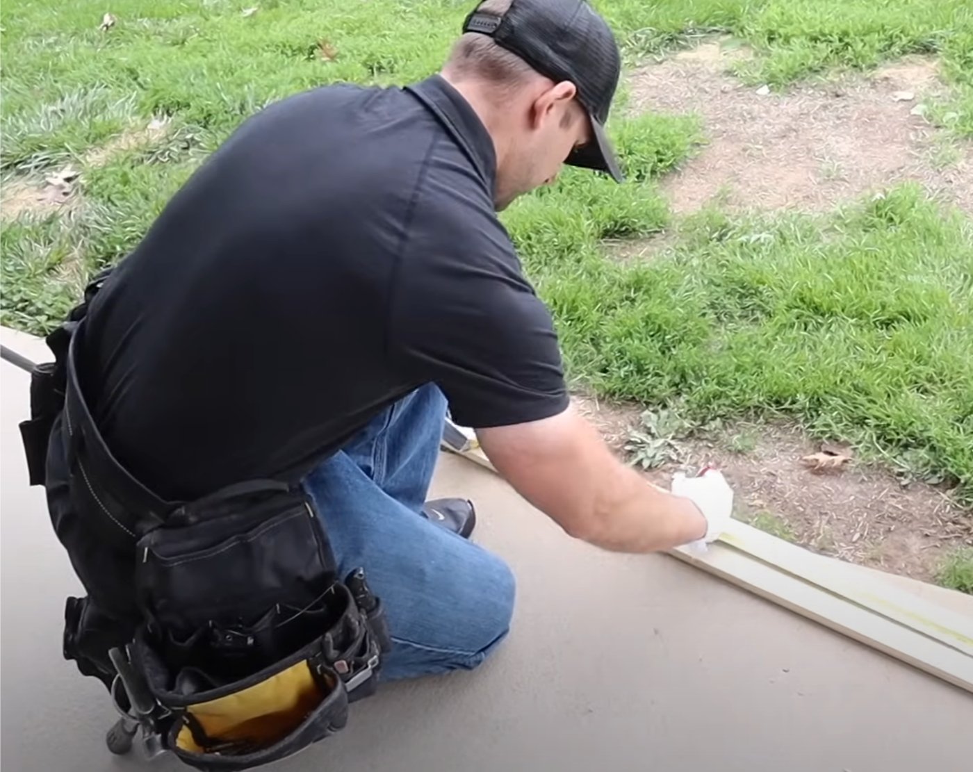 Technician Working on Sliding Door Track Repair