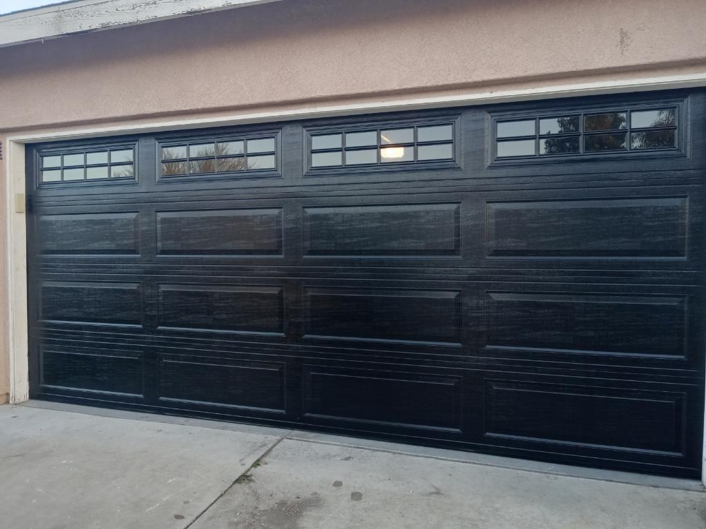 New black carriage garage door installation Long Beach CA
